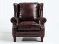 Sillón orejero tapizado efecto cuero 88x86x104 cm - Marrón oscuro - Diseño clásico con tachuelas