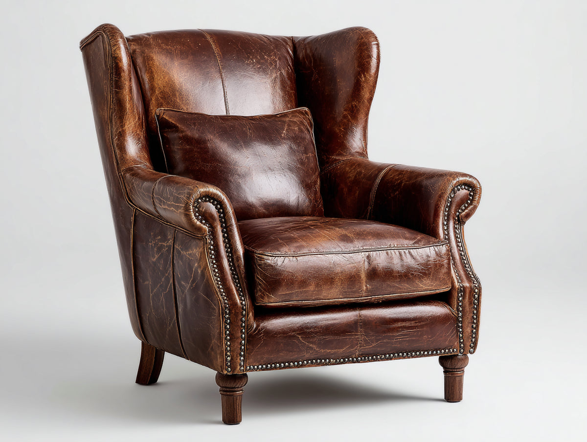 Sillón orejero 90 x 88 x 112 cm - marrón oscuro y madera - tapizado efecto piel con respaldo alto y tachuelas decorativas - diseño clásico para salón