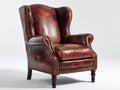 Sillón orejero tapizado efecto cuero 84x90x112 cm - Marrón coñac - Diseño clásico con tachuelas y patas torneadas